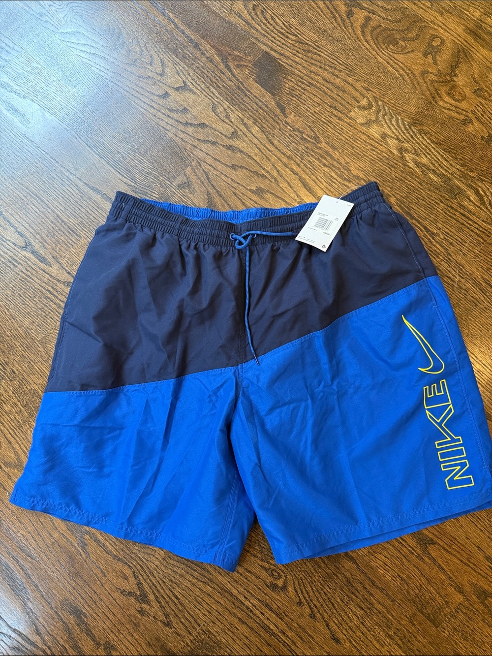 Nike Two-Tone Navy and Royal Blue Swim Shorts with Yellow Nike Swoosh